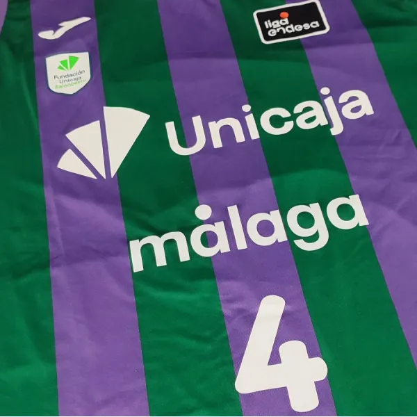 Camiseta Tyler Kalinoski primera equipacion Unicaja Malaga de Joma detalle